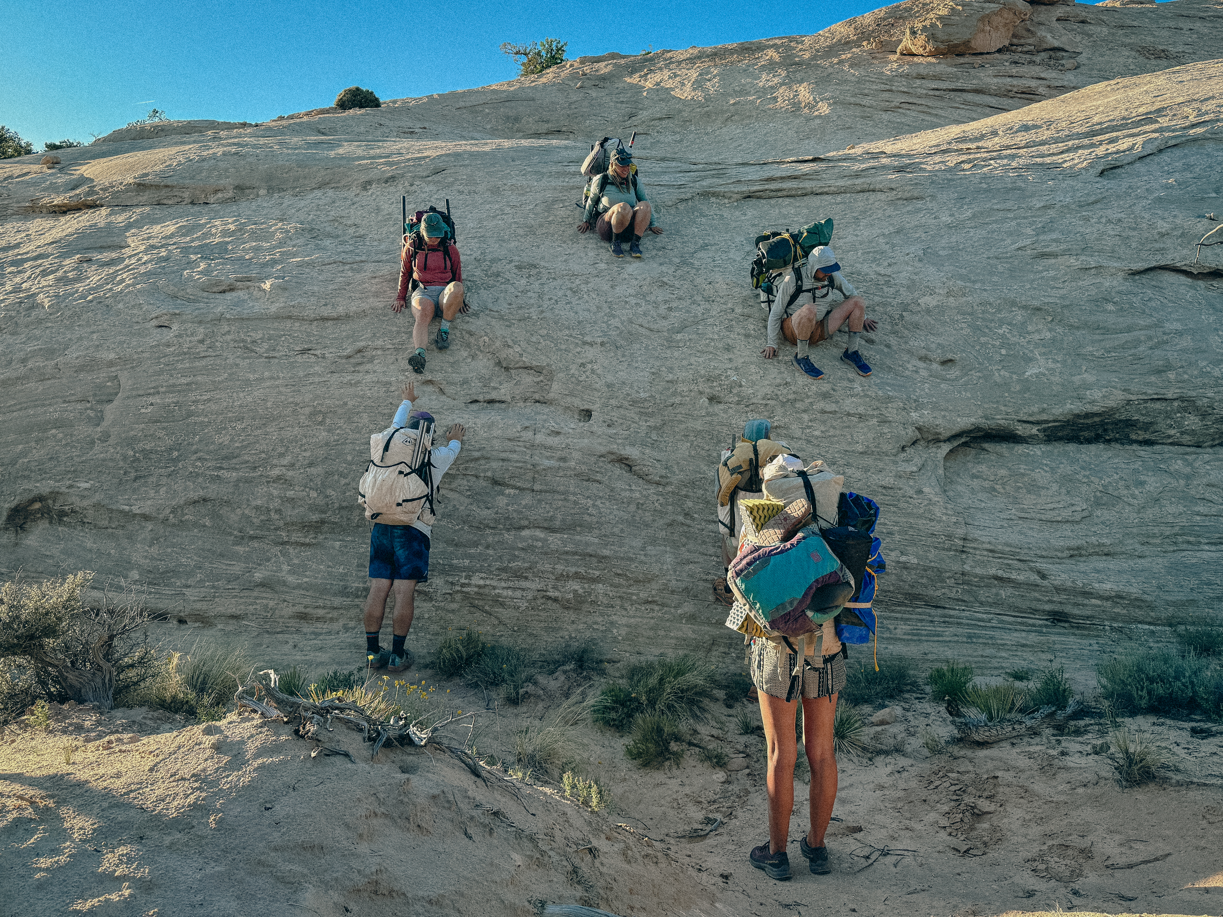 Hikers going down canyon